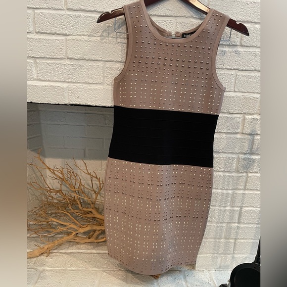 bebe Dresses & Skirts - Bebe grommet dress size small worn one time!